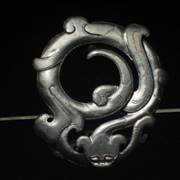Huan in shape of a coiled serpent - picture