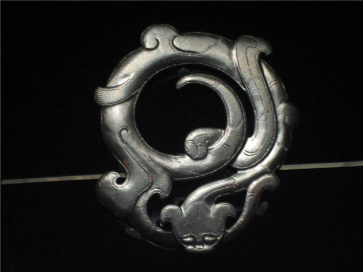 Huan in shape of a coiled serpent - picture